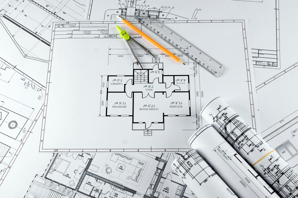 man standing in front of group of men